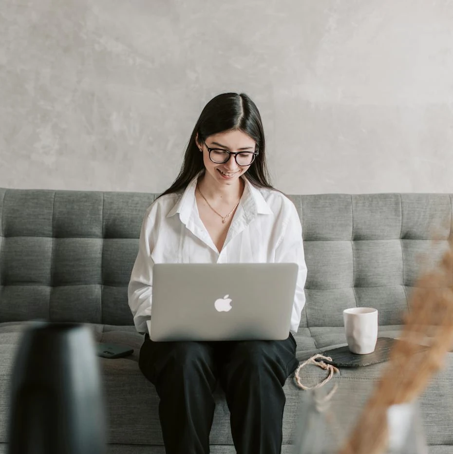 Woman smiling because she subscribed to the Gardiner Bryant email newsletter